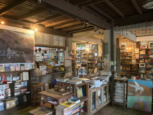 a book store with a lot of books on display at Banban Nannan Library and Guesthome in Nan