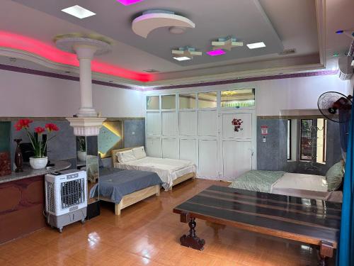 Кровать или кровати в номере Homestay Mộc Nguyên