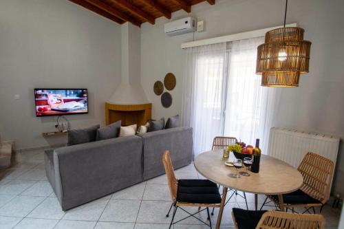 Televízia a/alebo spoločenská miestnosť v ubytovaní Avres Apartments