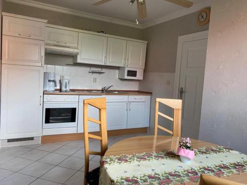 Kuchyň nebo kuchyňský kout v ubytování Gemütliche Ferienwohnung