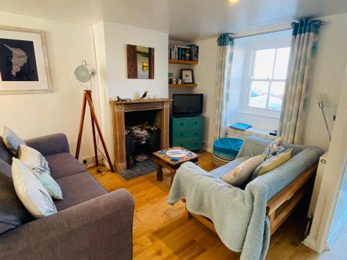 A seating area at Dory Cottage - Chesil Beach View