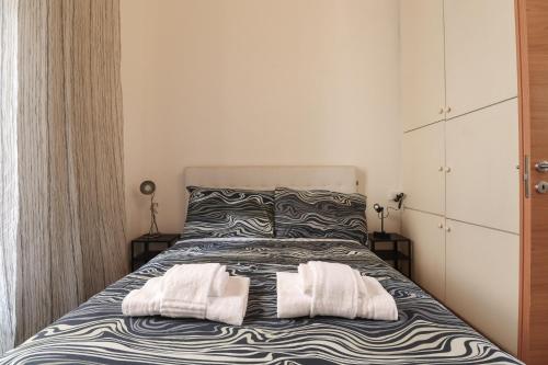 Posteľ alebo postele v izbe v ubytovaní HT RomeForAll