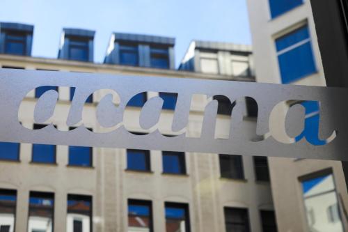 a sign for the company amazon in front of a building at acama Hotel & Hostel Kreuzberg in Berlin