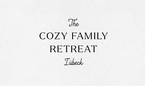 a sign that reads the cozy family retreathurst at The cozy family Retreat Lübeck in Lübeck