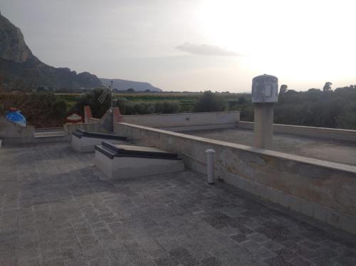 a rooftop of a building with a view of a field at B&B vacanze Mille Colori in Cinisi