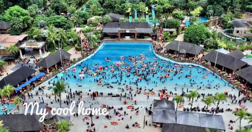an overhead view of a pool at a theme park at Sunway Onsen Suite Theme Park View Top Floor at Lost World in Tambun