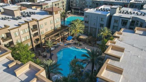 an aerial view of a resort with a swimming pool at Villa Desert Ridge condo in Phoenix