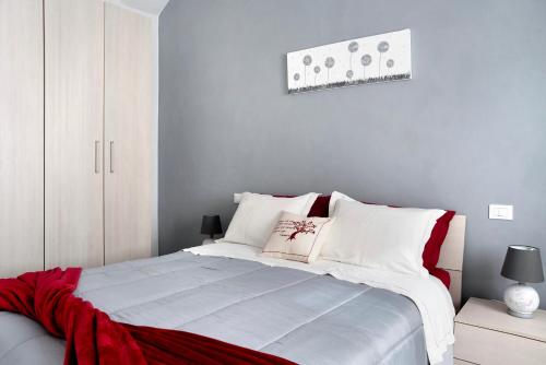 Postel nebo postele na pokoji v ubytování Casa Vacanze La Porta in Piazza