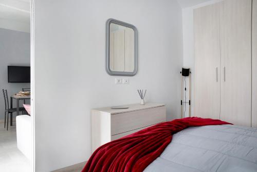 Ένα ή περισσότερα κρεβάτια σε δωμάτιο στο Casa Vacanze La Porta in Piazza
