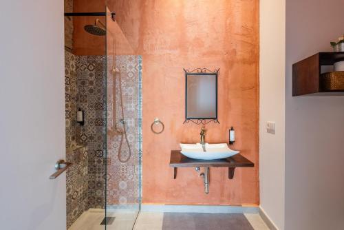 a bathroom with a sink and a shower at Málaga Boutique Adults Recommended in Málaga