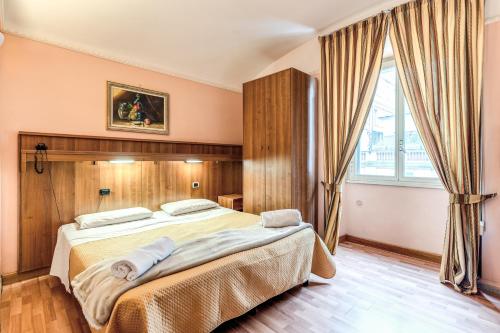 Кровать или кровати в номере Hotel Altavilla