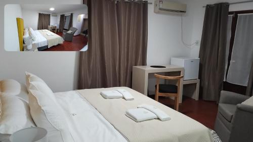 En eller flere senge i et værelse på My Place Boutique Hotel