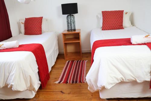 Letto o letti in una camera di Sabie River Bush Lodge