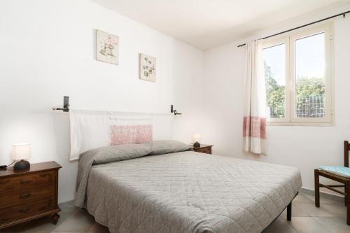 Ένα ή περισσότερα κρεβάτια σε δωμάτιο στο Villa Maria