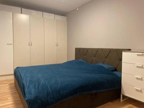 En eller flere senge i et værelse på Modern apartment in Ørestad