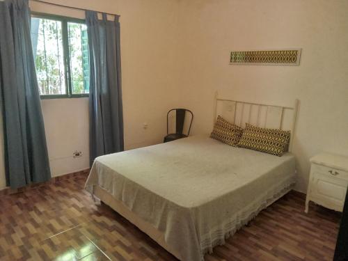 Ένα ή περισσότερα κρεβάτια σε δωμάτιο στο Villa francisca