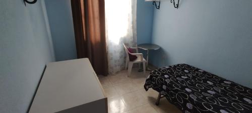 Katil atau katil-katil dalam bilik di Tenerife Homestay
