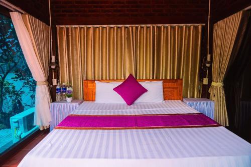 Katil atau katil-katil dalam bilik di Tam Coc Cat Luong Homestay