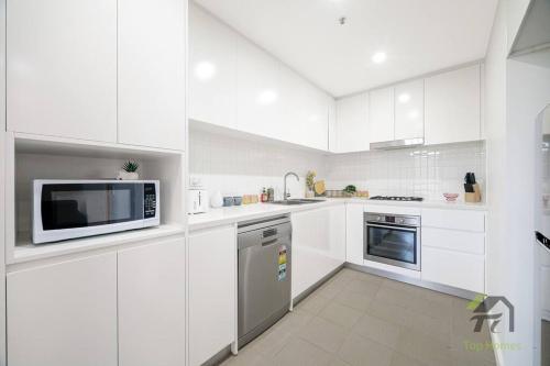 Una cocina o cocineta en Wonderful Condo in Parramatta