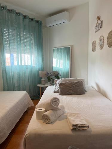 Katil atau katil-katil dalam bilik di Evens-Goretti House