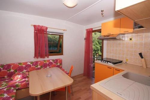 Cucina o angolo cottura di Acquaviva Village Camping