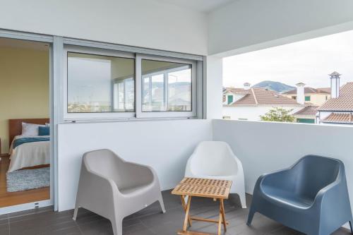 En eller flere senge i et værelse på Casa verde