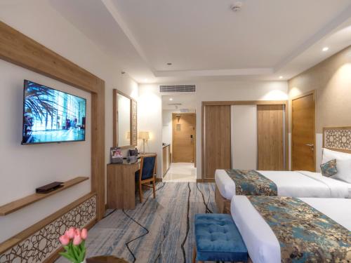 TIME Ruba Hotel & Suitesにあるベッド