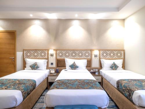 TIME Ruba Hotel & Suitesにあるベッド