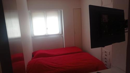 โทรทัศน์และ/หรือระบบความบันเทิงของ Check and Home - Independencia - 6 huéspedes Moderno tipo Duplex con Cochera en el Centro
