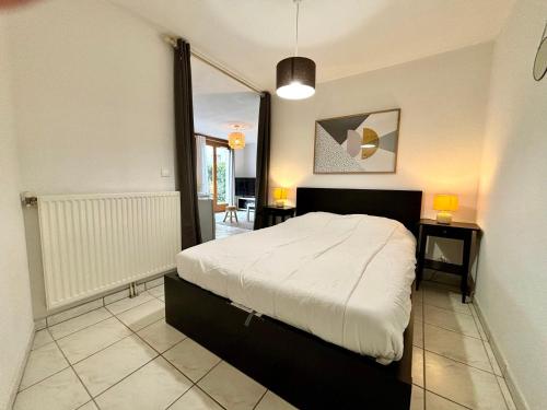 Ένα ή περισσότερα κρεβάτια σε δωμάτιο στο Appartement Annecy, 1 pièce, 2 personnes - FR-1-432-44