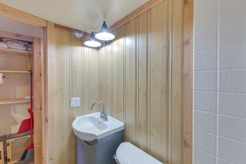 a bathroom with a sink and a toilet at Quiet Lake Almanor Cabin, Steps to Fishing in Lake Almanor