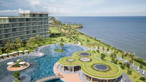 an aerial view of the resort and the ocean at Biệt Thự Villa - Sao Biển - Ngọc Trai FLC Sầm Sơn in Sầm Sơn
