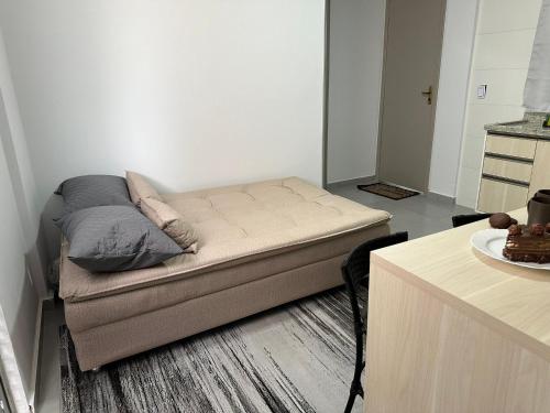 Cama o camas de una habitación en Flamingo Pé na Areia Economico