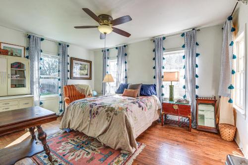 a bedroom with a bed and a ceiling fan at Quiet Fort Worth Home Less Than 1 Mi to TCU Campus! in Fort Worth