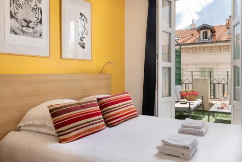 Postel nebo postele na pokoji v ubytování Hôtel Byakko Nice
