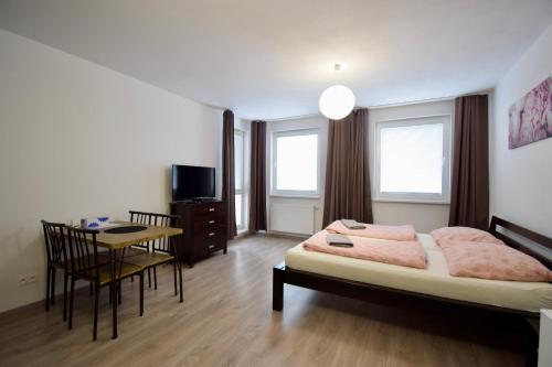 Postel nebo postele na pokoji v ubytování Apartmán Zlatovská 22B