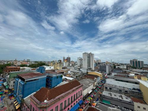 an overhead view of a city with buildings at Apartamento Centro Manaus 921 in Manaus