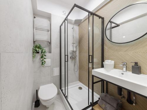 Kúpeľňa v ubytovaní Franciszkanska Blueberry Apartment