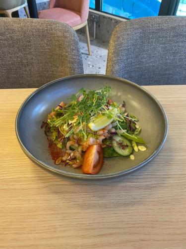 a plate of food sitting on a table at China Fleet Country Club in Saltash
