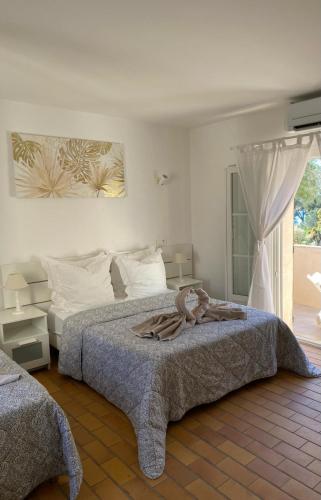 Llit o llits en una habitació de Le Refuge