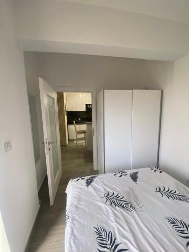 Ένα ή περισσότερα κρεβάτια σε δωμάτιο στο Apartman Aurora