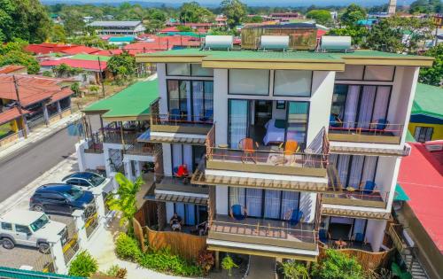 an aerial view of a house with balconies at La Fortuna Lodge by Treebu Hotels in Fortuna