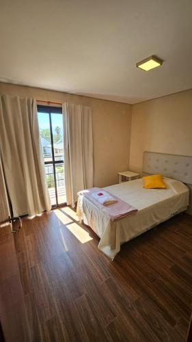 Ένα ή περισσότερα κρεβάτια σε δωμάτιο στο Casa Ruta