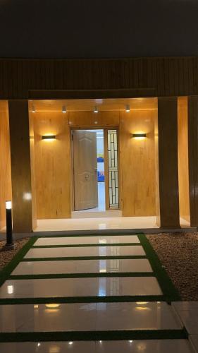 a lobby of a building with a reflection in the water at MN’s villa in Nouakchott