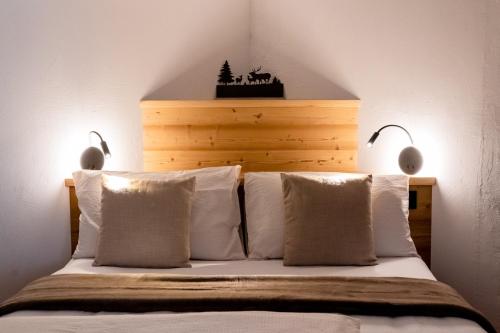 Cama o camas de una habitación en Negritella Sweet Hotel