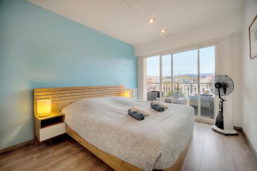 Ένα ή περισσότερα κρεβάτια σε δωμάτιο στο Mary - Terrasse - Moderne - VCA