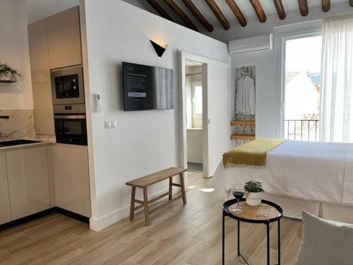 Ένα ή περισσότερα κρεβάτια σε δωμάτιο στο Atroe Apartment