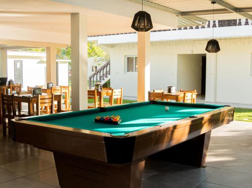 a pool table in the middle of a patio at amaremar in San Luis