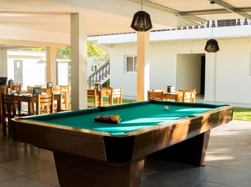 a pool table in the middle of a patio at amaremar in San Luis La Herradura