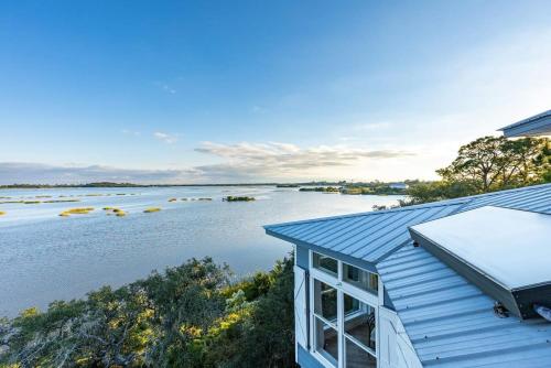 a view of a river from a house at 3 Story Haven Fire Pit kayaks updated 360 Views in Cedar Key
